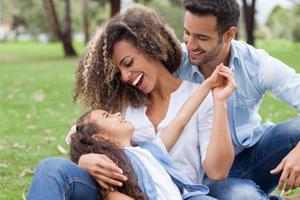 Family image of woman, man and young girl