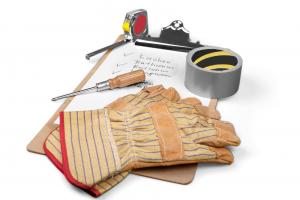 Gloves, tools, and a clipboard