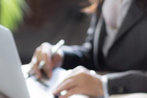 lawyer at desk on computer