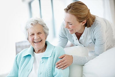 Another old woman with nurse