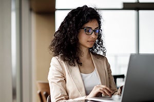 woman on computer in office