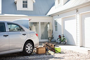 car parked in front of a house