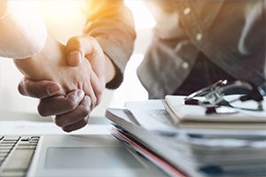 close up view of a handshake