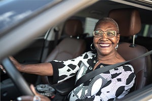 Elderly lady driving a car
