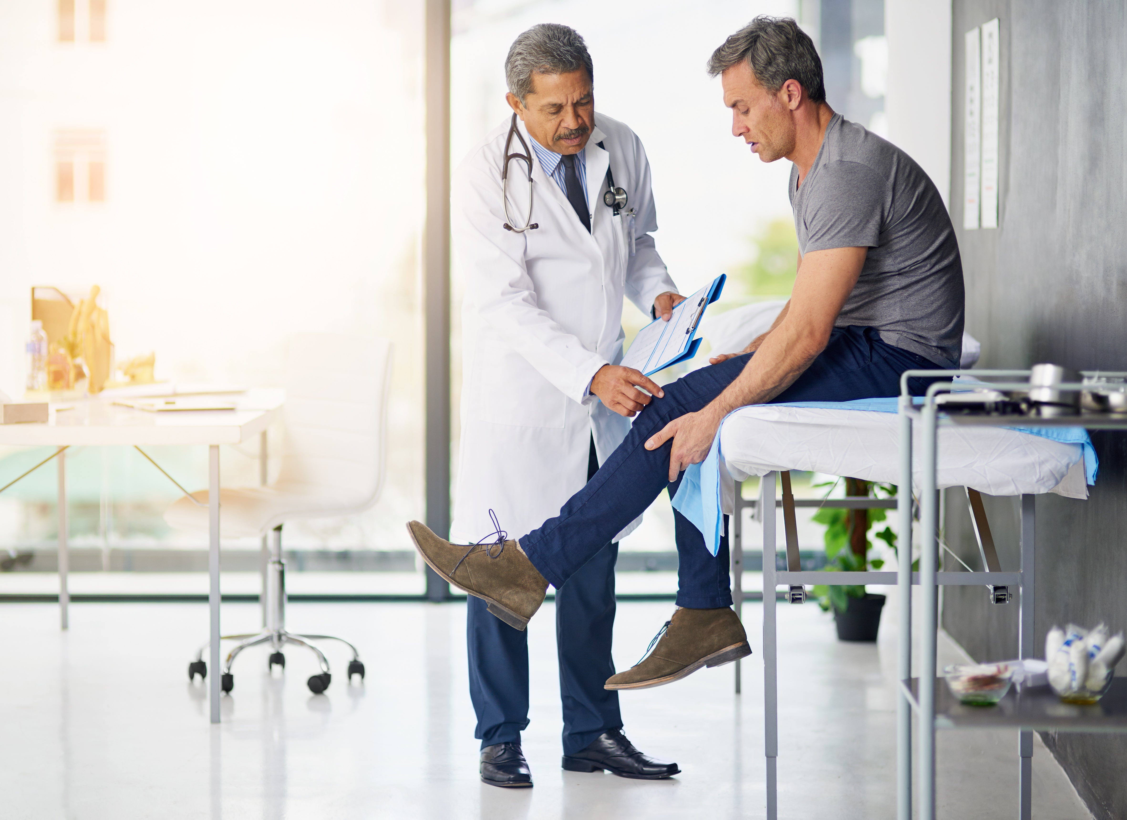 Doctor examining a patient 