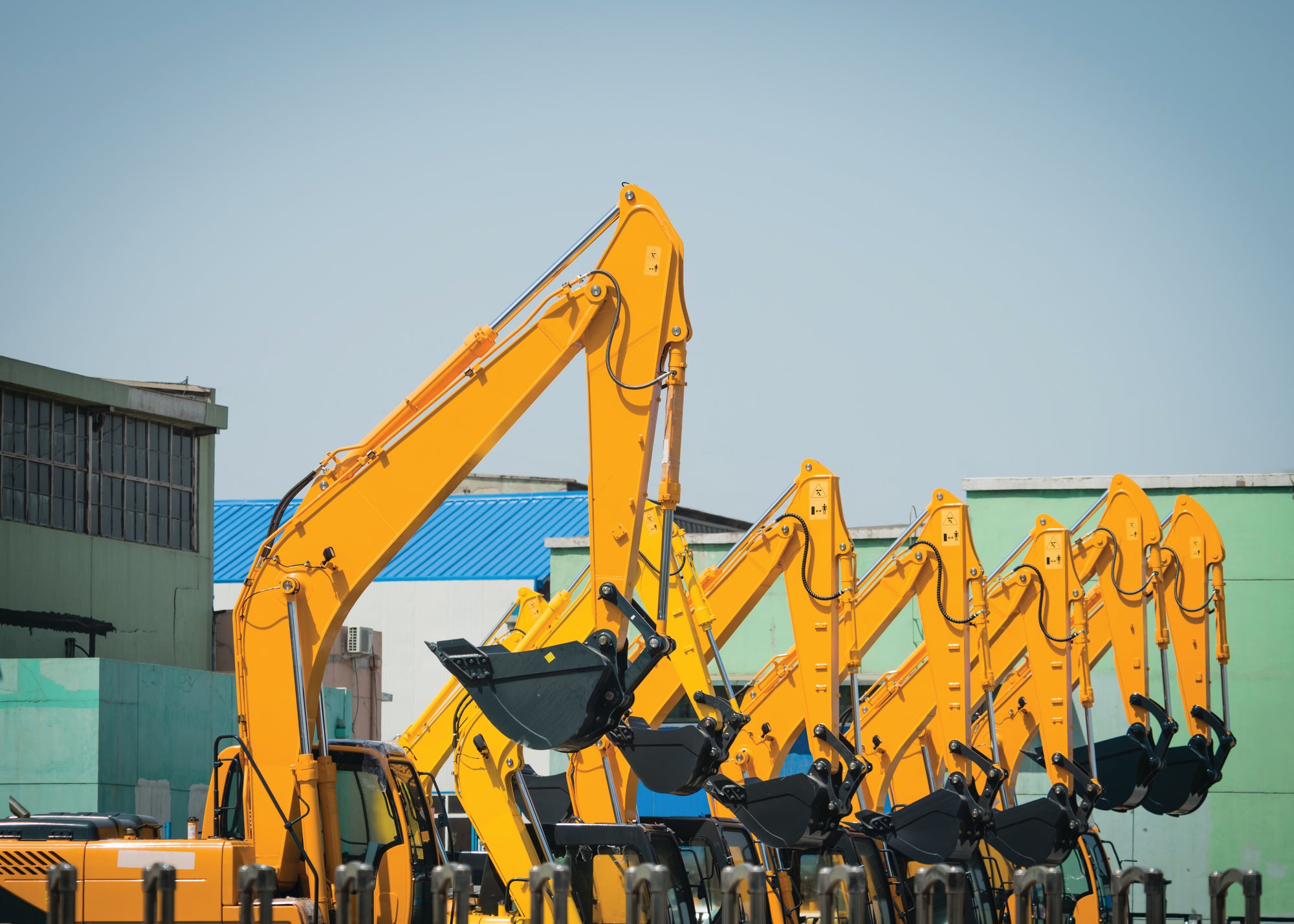 excavators in line
