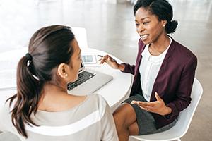 two women having a meeting 