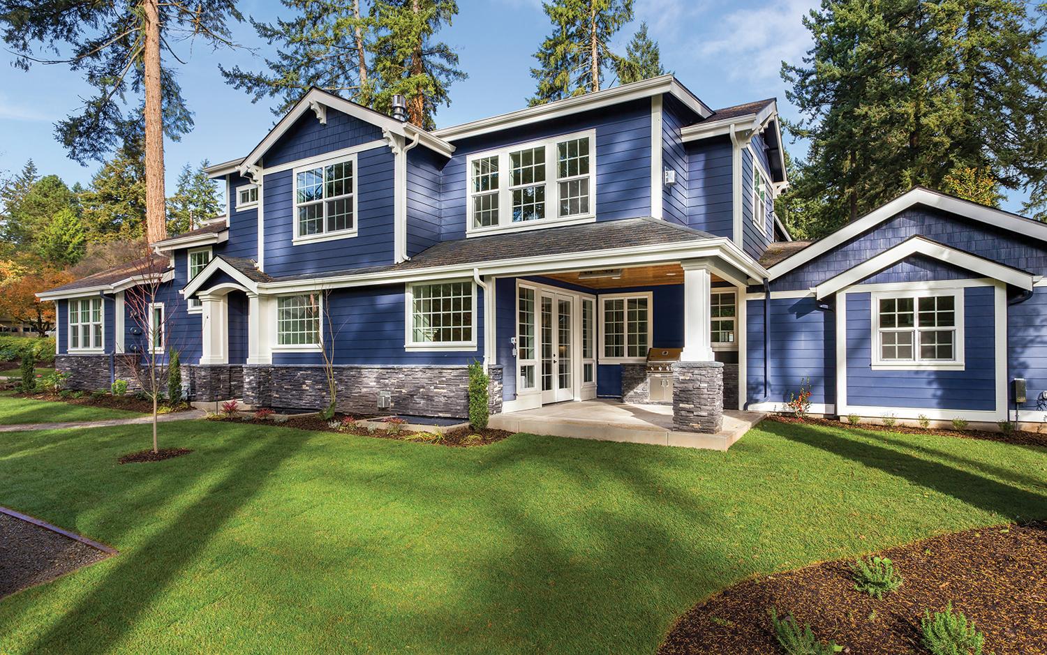 nice blue home with front yard