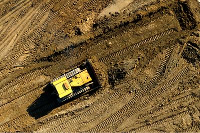 Overhead view of a bulldozer on a job site 
