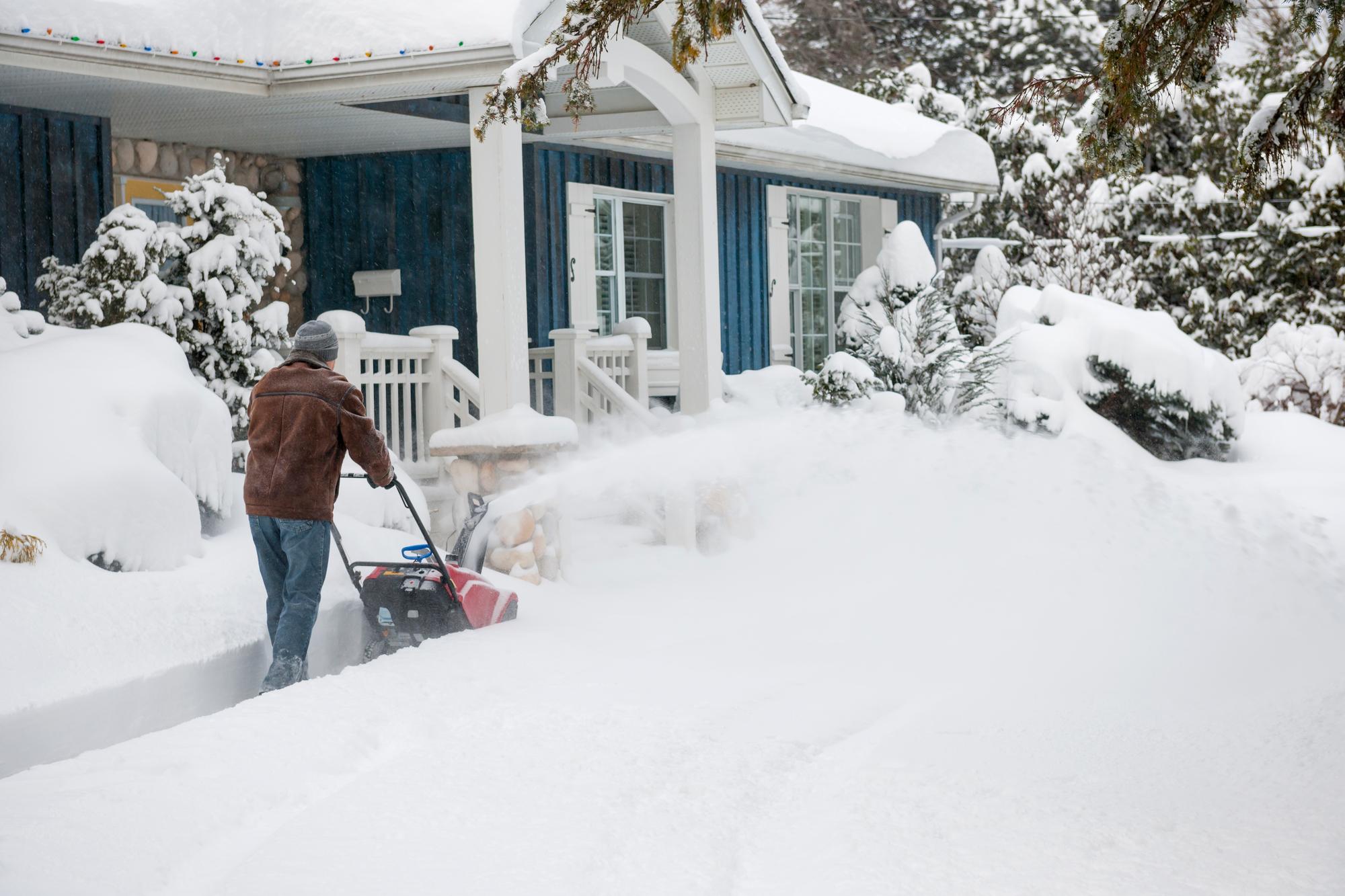 Man using Snowblower_iS475488773.jpg