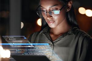 Software developer analyzing technology equipment