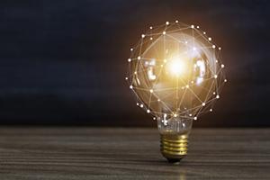 Stylized image of a lightbulb surrounded by interconnected dots