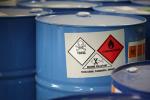 barrels with hazard signs 