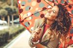 woman holding umbrella