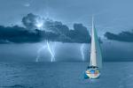 Sailboat on the ocean in stormy weather