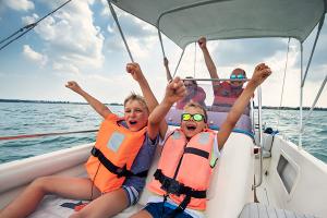 excited family on boat ride