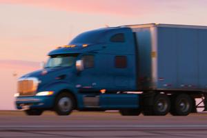 truck driving down highway