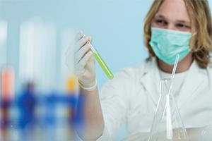 Woman holding test tube