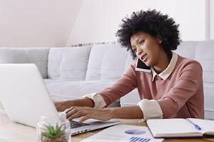 Young lady in front of a laptop 