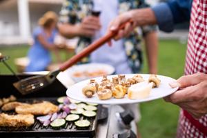 person grilling