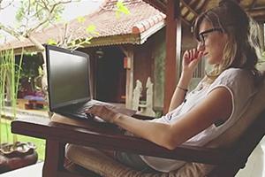 Woman sitting at computer