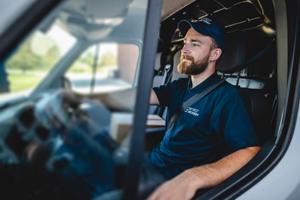 man driving a van