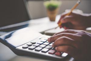 Hands at computer keyboard