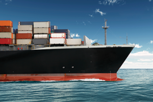 cargo ship being unloaded at dock