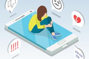 Illustration of teen sitting on a large cell phone, being cyberbullied by emojis