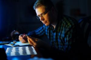 Appraiser examines coin collection